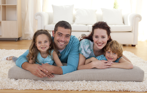 Family lying down together.