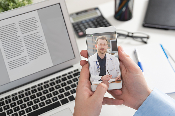 Telehealth meeting on a phone.