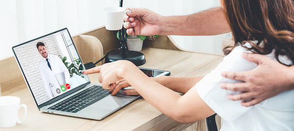 Virtual care telehealth visit on laptop
