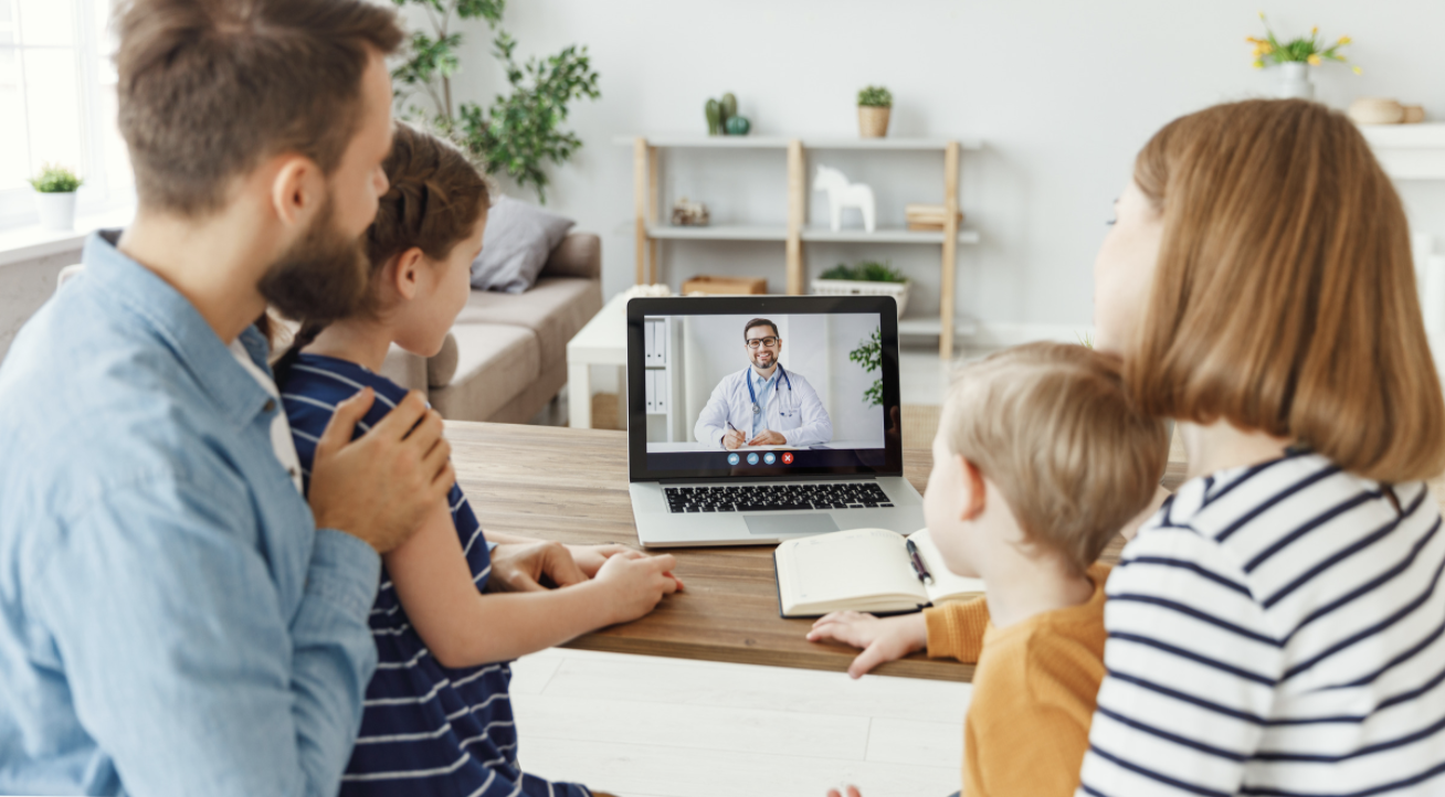 family virtual telehealth visit with doctor on laptop