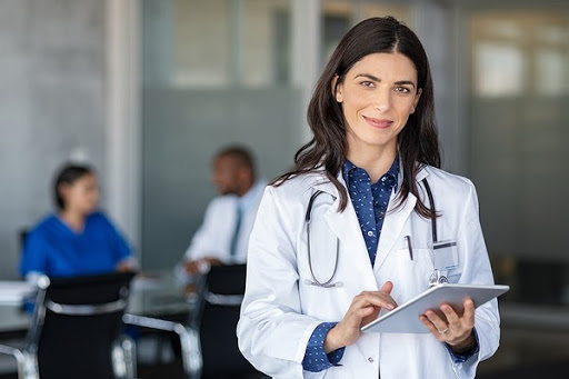 female doctor with tablet health sharing