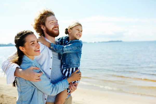 Smiling family on beach