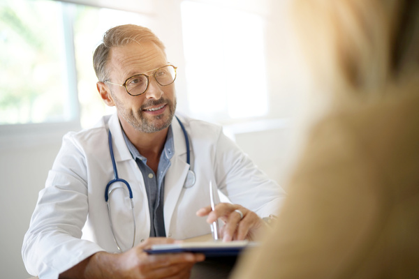 Doctor talking to patient